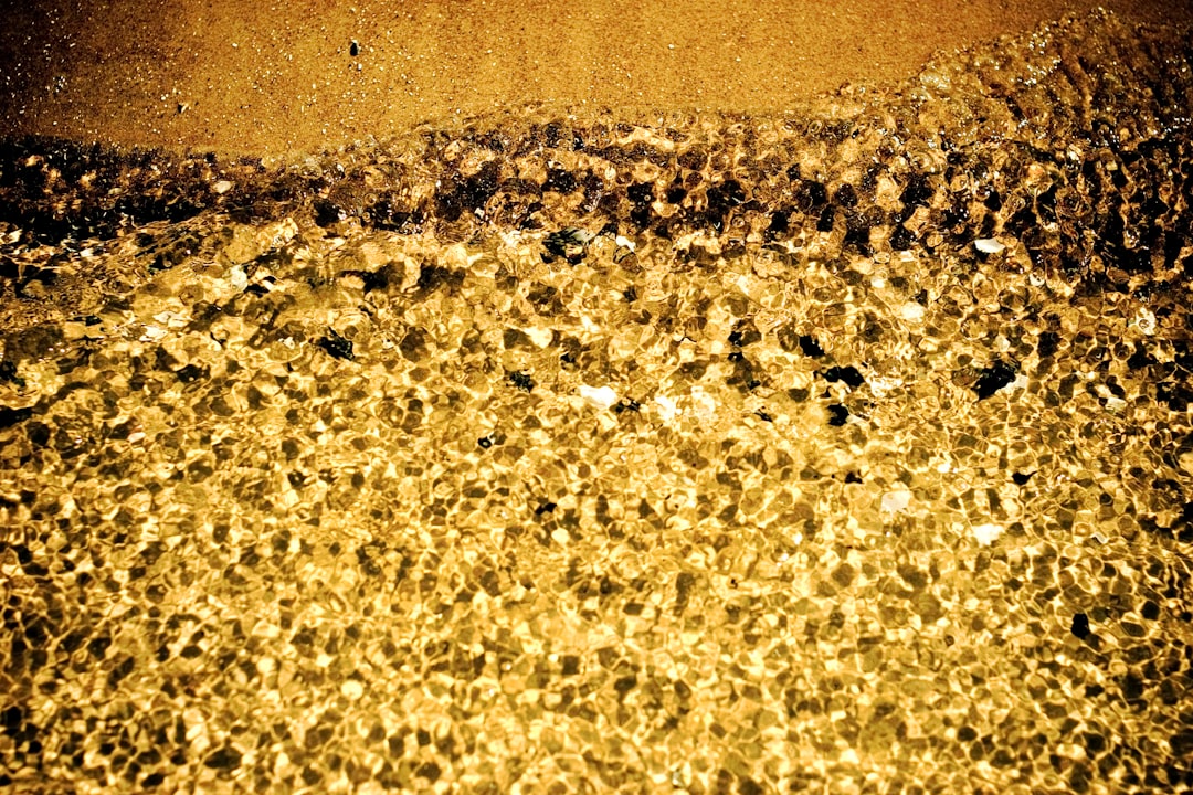 a close up of a yellow substance on a surface